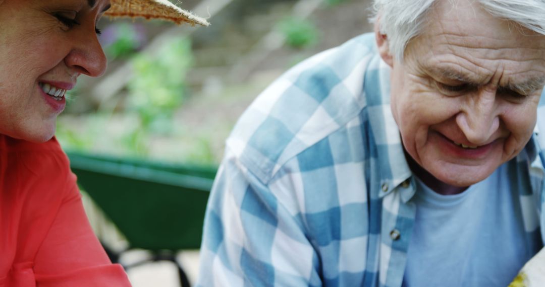 Senior Couple Enjoying Time Together Outdoors Smiling and Bonding