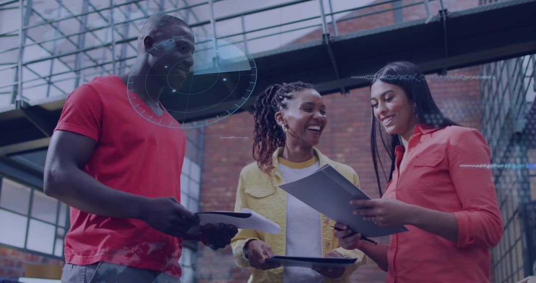 Young Professionals Collaborating Around Digital Tools and Documents