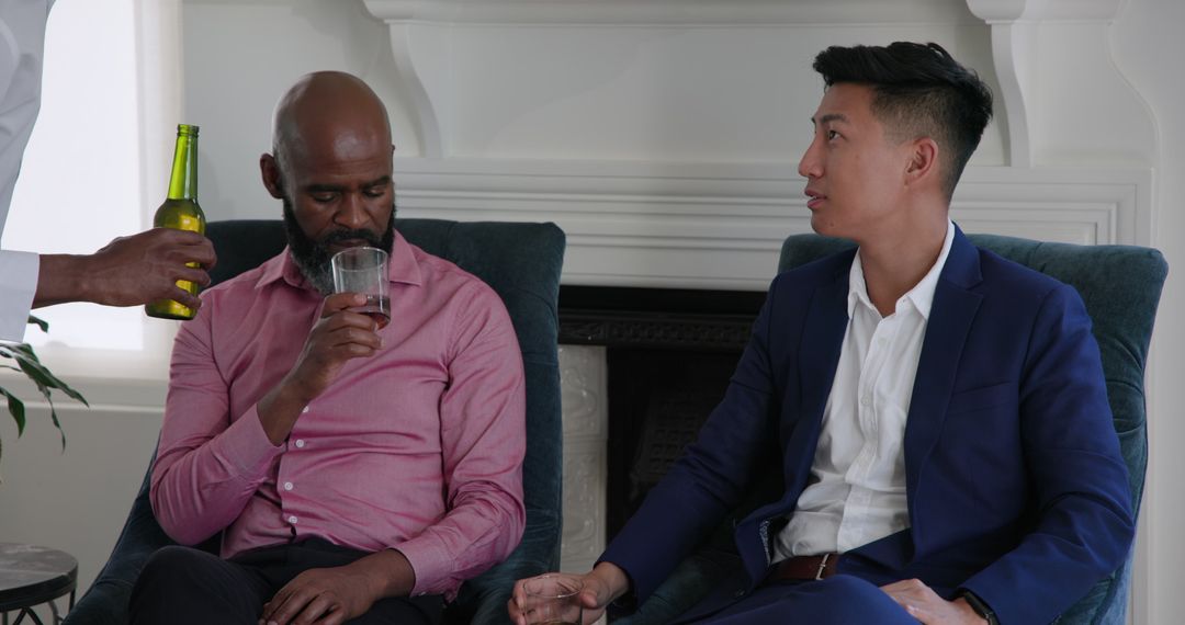 Multicultural Friends Enjoying Drinks at Home