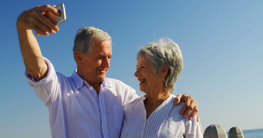 Happy Senior Couple Taking Selfie on Sunny Day - Free Images, Stock Photos and Pictures on Pikwizard.com