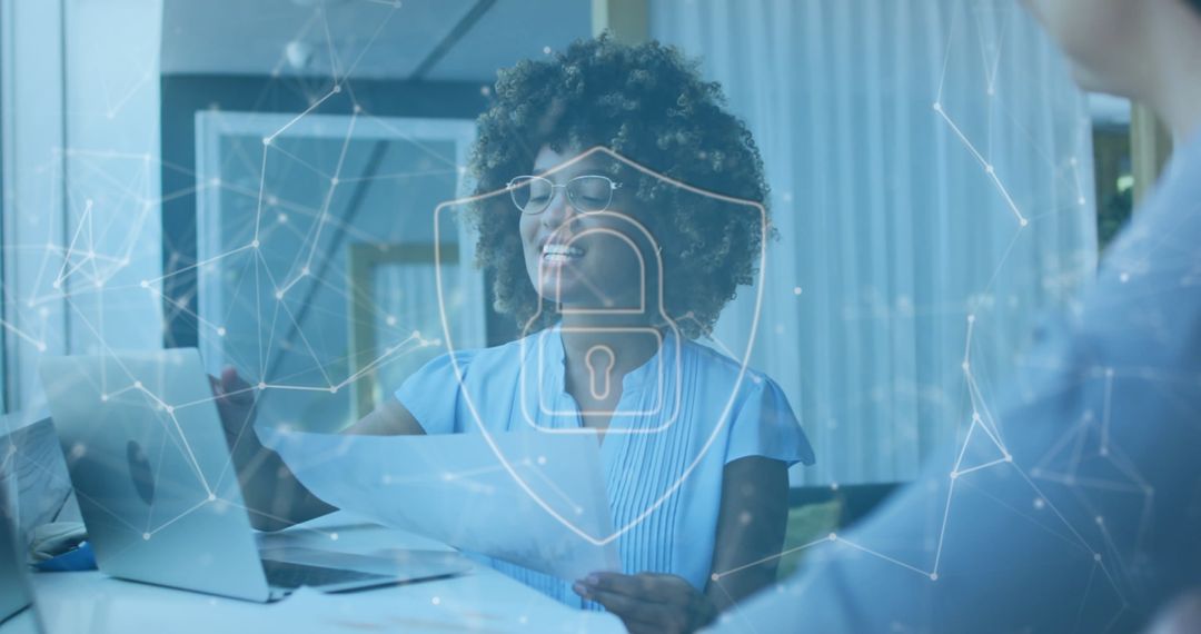 Diverse Professionals Discussing Digital Security in Modern Office