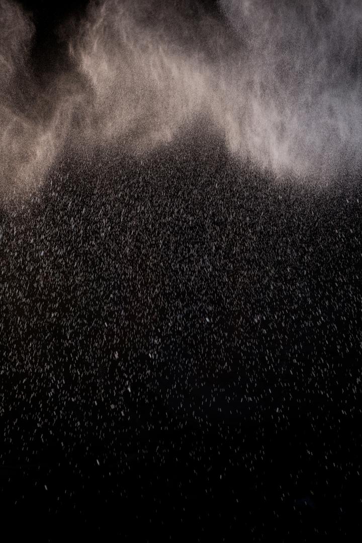 Close-up of Dust Particles in Air on Black Background - Free Images, Stock Photos and Pictures on Pikwizard.com