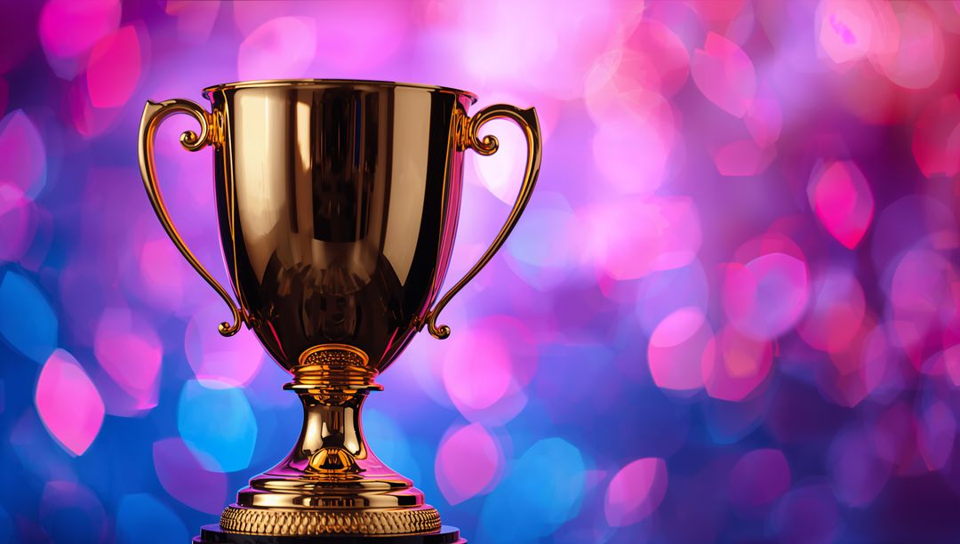 Glittering Gold Trophy Cup Gleaming on Stand with Magenta-Blue Bokeh Celebration Backdrop