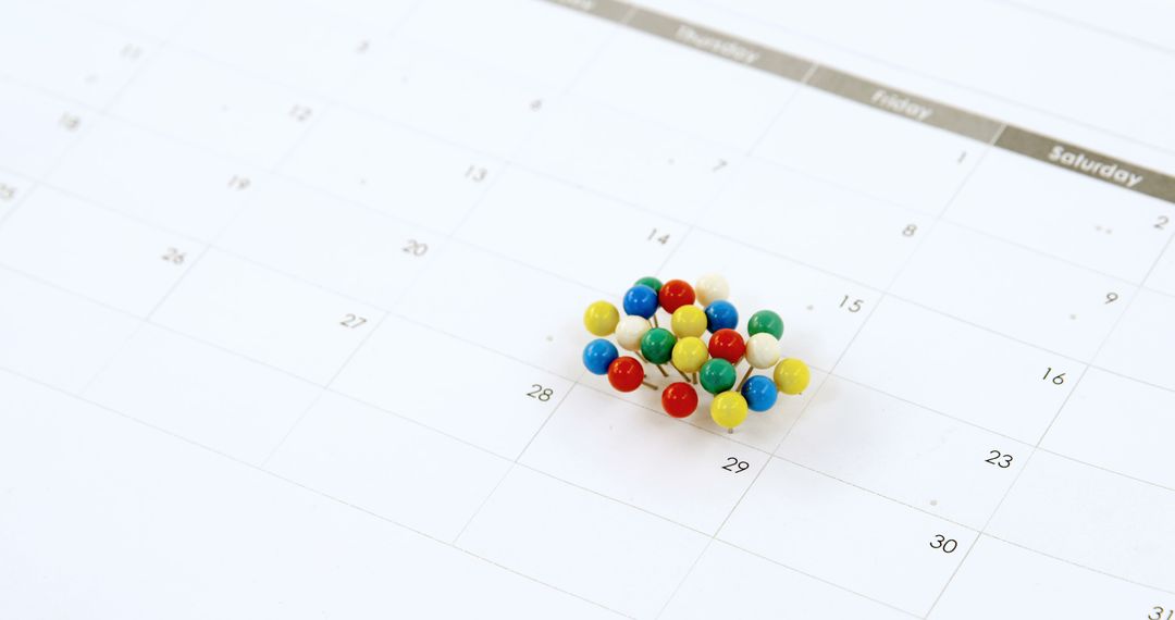 Colorful Push Pins on Blank Monthly Calendar - Free Images, Stock Photos and Pictures on Pikwizard.com