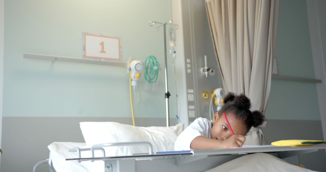 Young African American Child Recovering in Hospital Bed - Free Images, Stock Photos and Pictures on Pikwizard.com