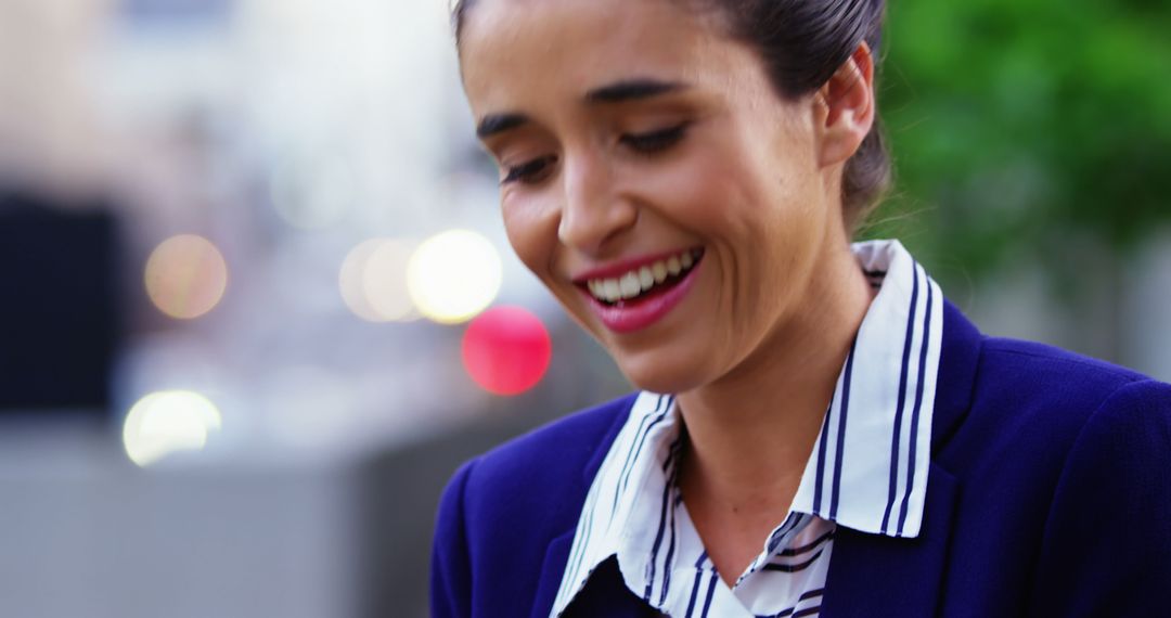 Smiling Businesswoman in Blue Blazer Outdoors - Free Images, Stock Photos and Pictures on Pikwizard.com