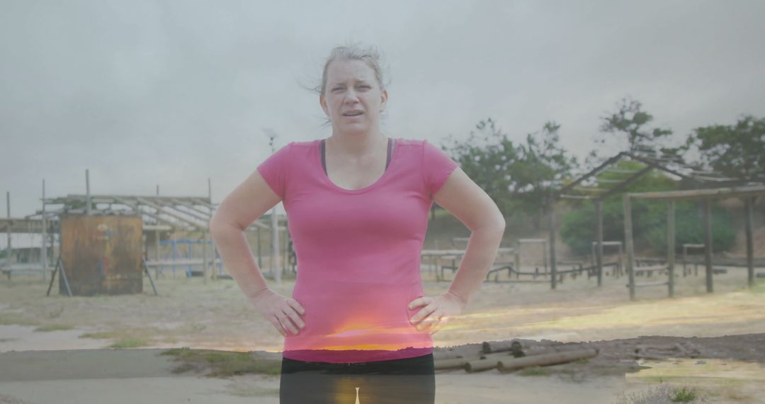 Woman Navigating Rustic Obstacle Course with Determination