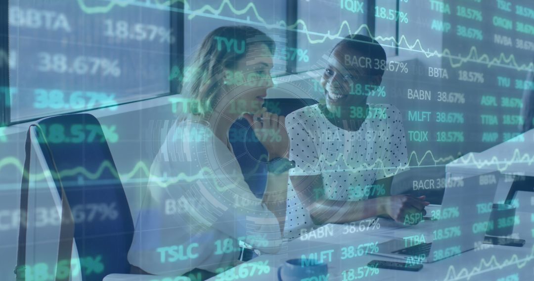 Diverse Coworkers Analyzing Stock Market Data on Computer Screens - Free Images, Stock Photos and Pictures on Pikwizard.com