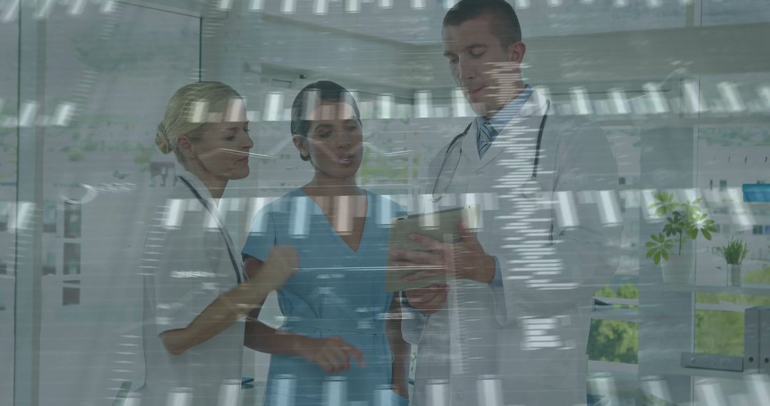 Medical Team Analyzing Data on Tablet in Modern Clinic
