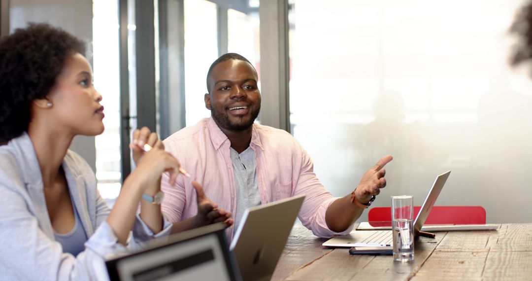 Diverse Coworkers Brainstorming Strategy in Office