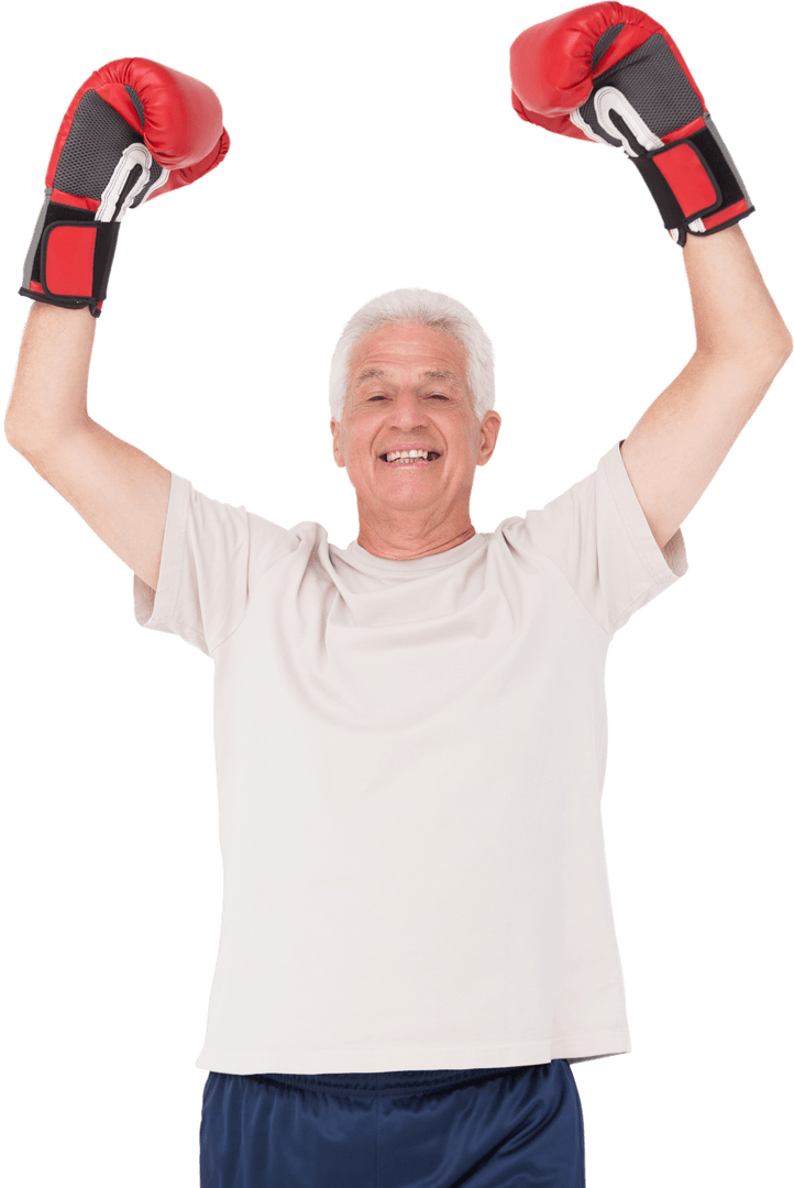 Senior Man in Red Boxing Gloves on White Background Standing Strong