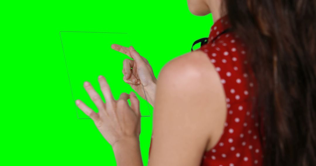 Woman Using Transparent Touchscreen with Green Chroma Key Background - Free Images, Stock Photos and Pictures on Pikwizard.com