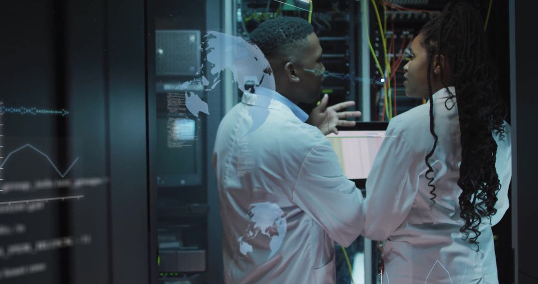 Engineers Collaborating in Data Center with Digital Overlays