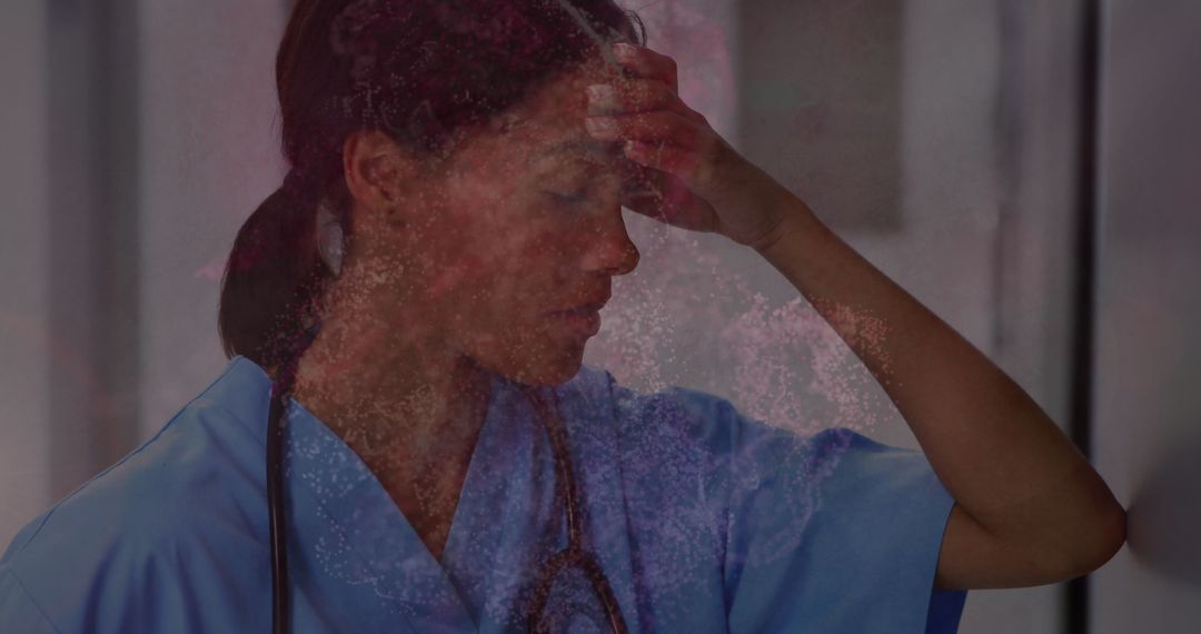 Stressed Healthcare Worker Handling Workload in Hospital