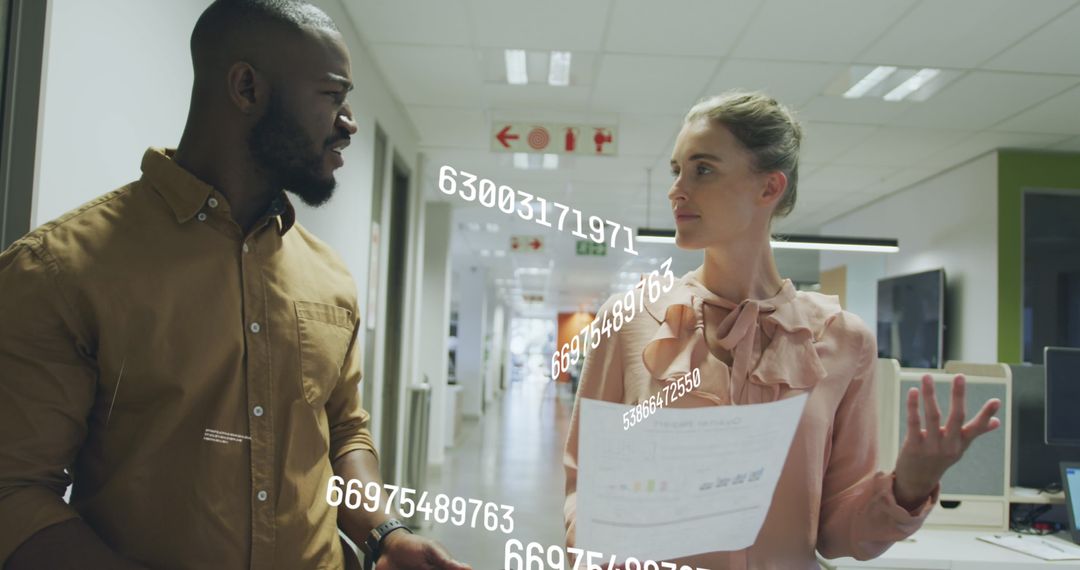Business Team Collaborating with Data Projections in Modern Office