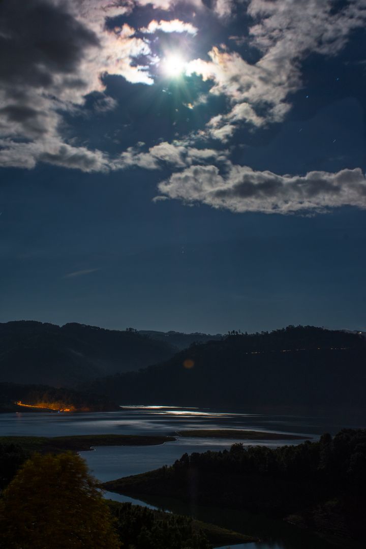 Full Moon Illuminating Serene Night at Mountainous Lake - Free Images, Stock Photos and Pictures on Pikwizard.com