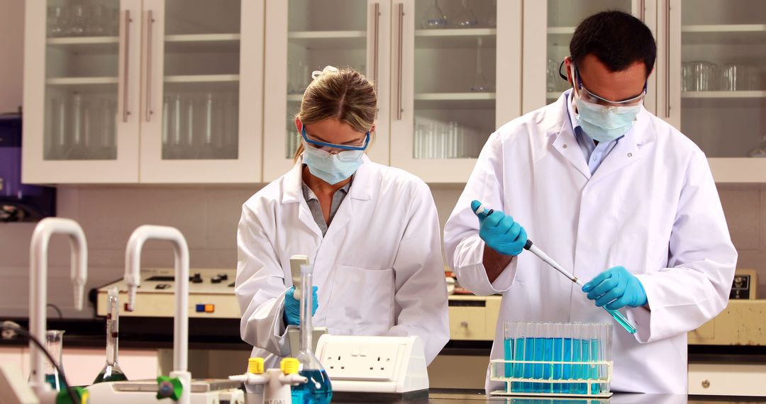 Scientists Conducting Laboratory Research Experiment - Free Images, Stock Photos and Pictures on Pikwizard.com