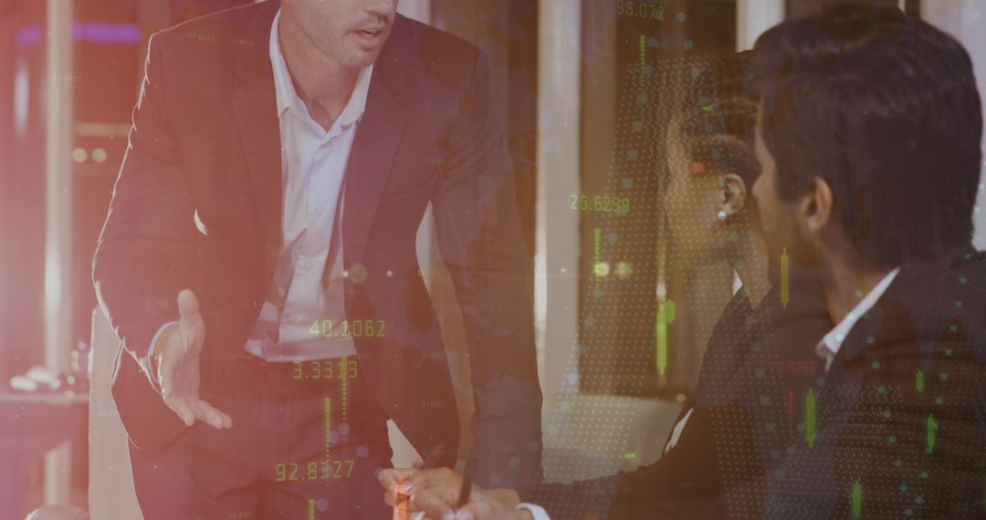 Diverse Business Team Discussing Data Analytics in Modern Office