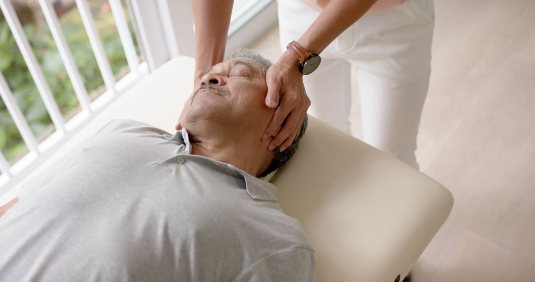 Chiropractor Adjusting Senior Patient's Neck in Gentle Medical Treatment - Free Images, Stock Photos and Pictures on Pikwizard.com