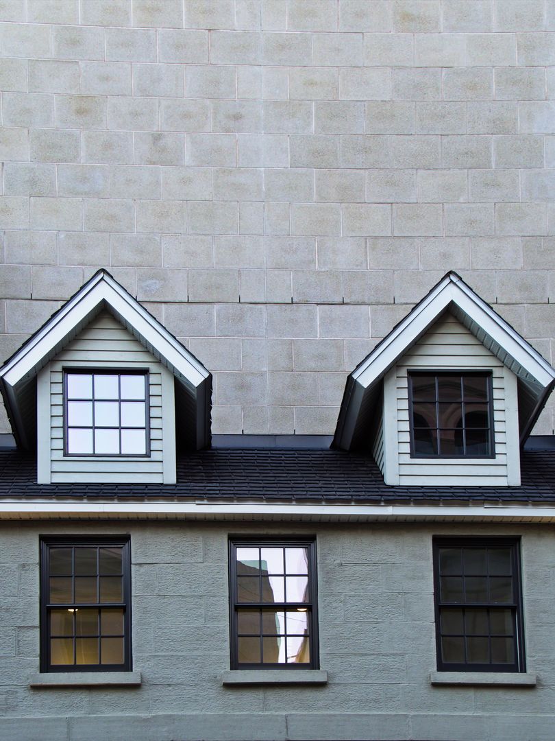 Urban Architecture Windows-Two Dormers on Stone Building