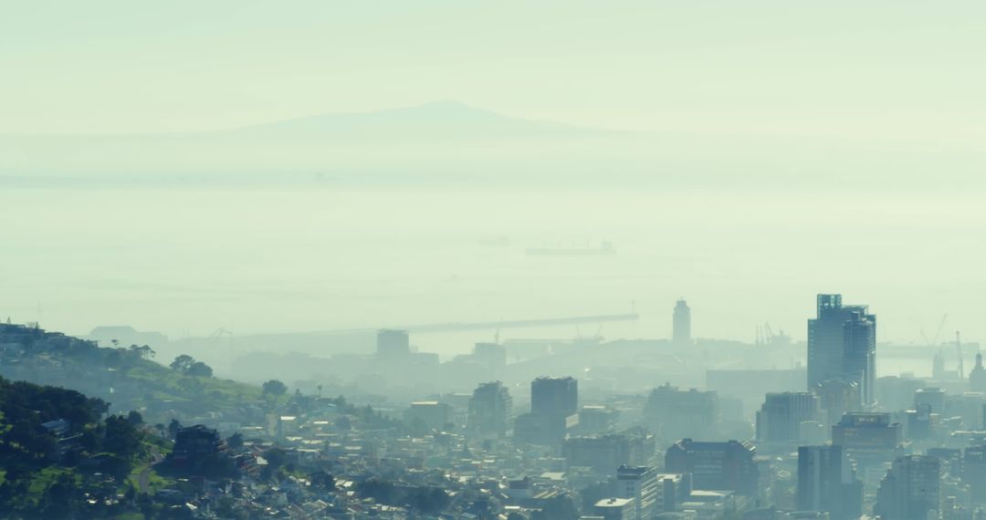 Foggy Modern Cityscape with Distant Horizon and Atmospheric Mist