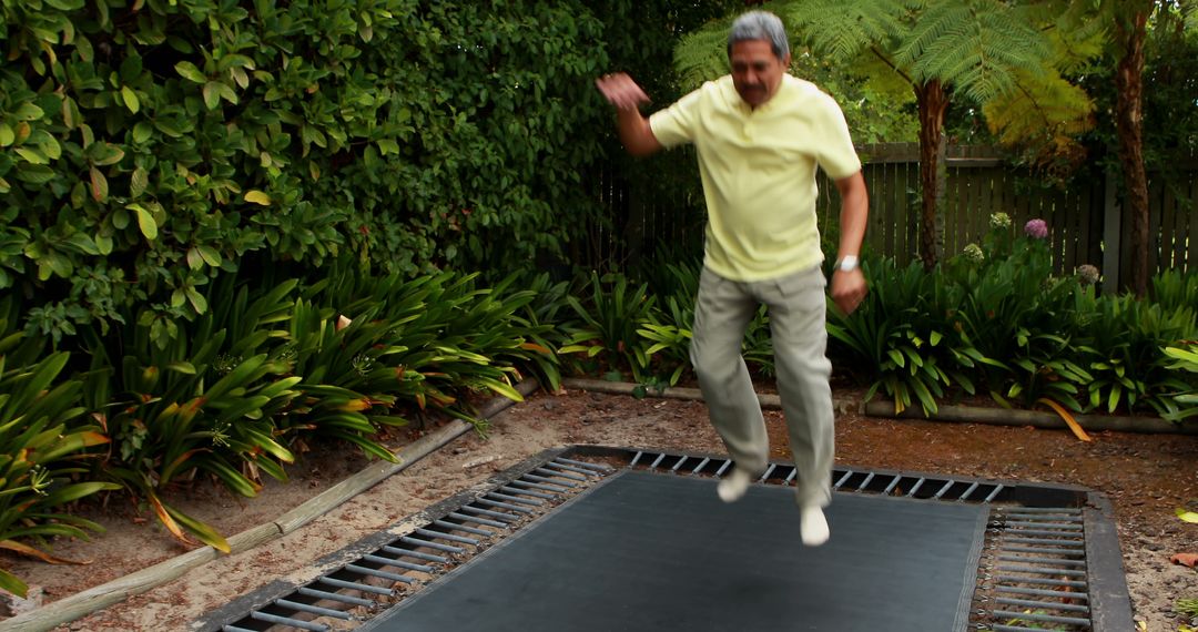 Senior Man Enjoying Trampoline Workout in Backyard - Free Images, Stock Photos and Pictures on Pikwizard.com