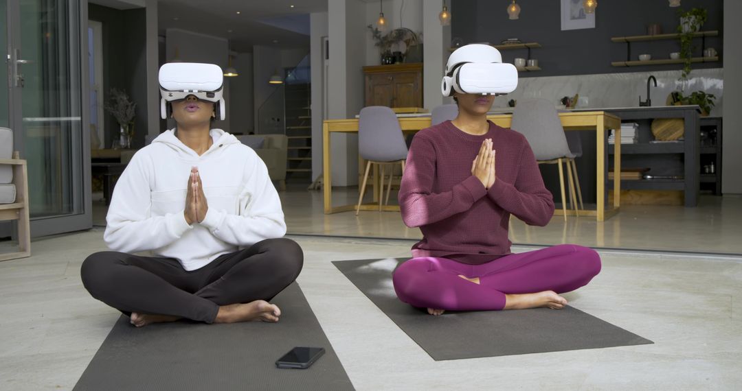 Two Women Practicing Virtual Reality Meditation Indoors