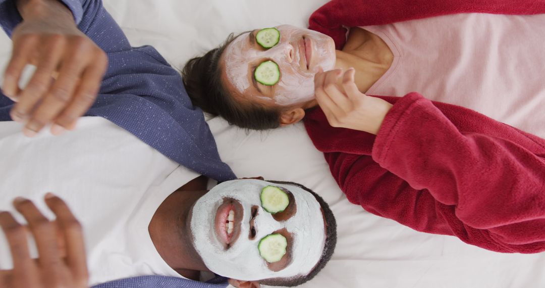 Diverse Couple Enjoying Spa Day with Facial Masks - Free Images, Stock Photos and Pictures on Pikwizard.com