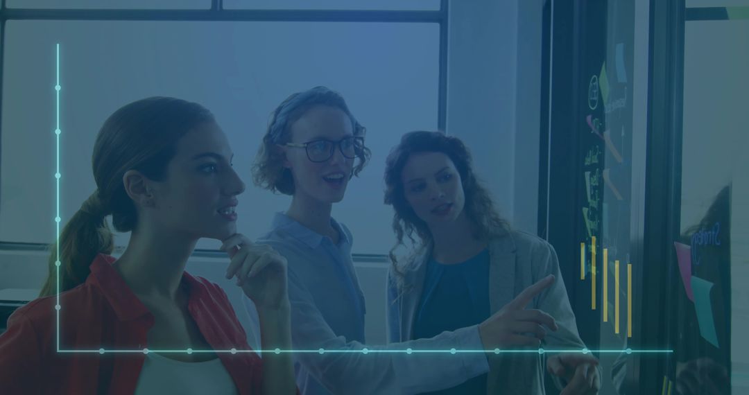 Creative Business Team Analyzing Data with Touchscreen