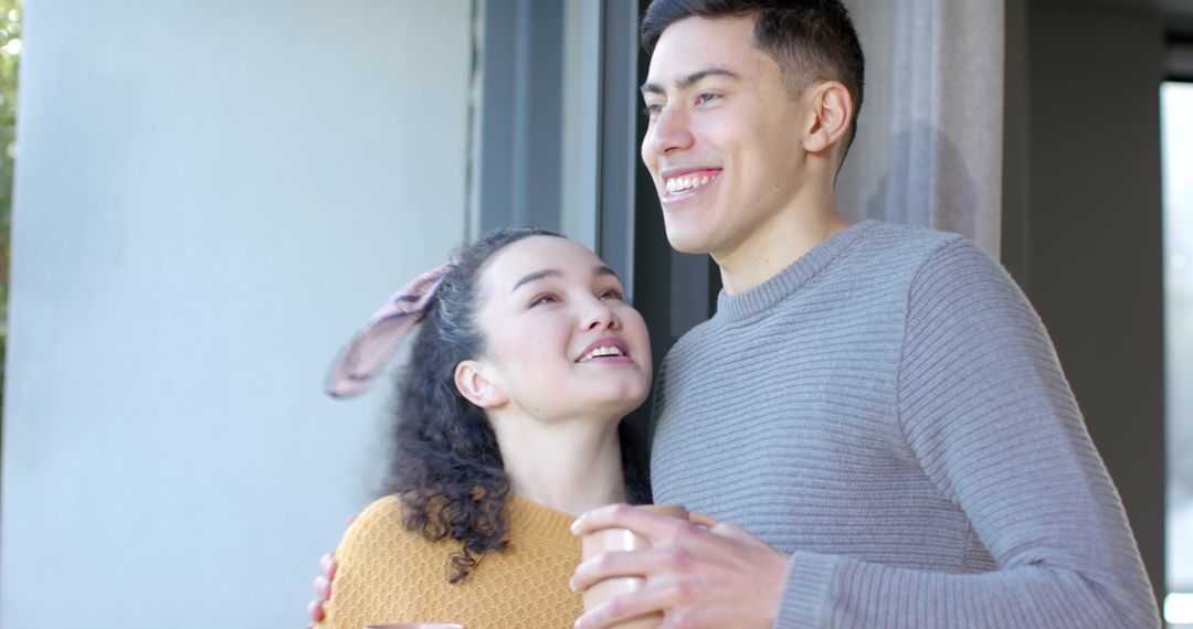 Diverse Couple Enjoying Cozy Moment Together at Home