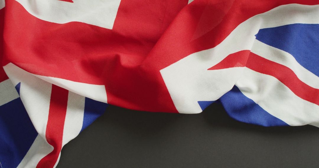 Image of creased flag of great britain lying on white background - Free Images, Stock Photos and Pictures on Pikwizard.com
