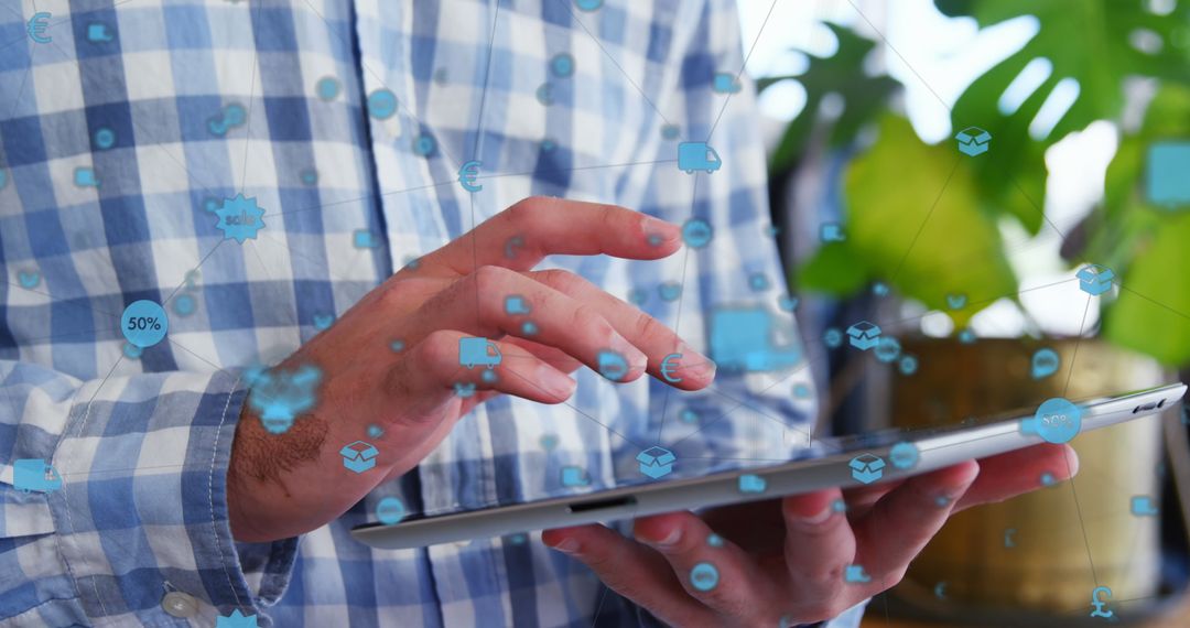 Man Using Digital Tablet with Floating Social Media Icons