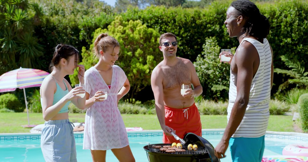 Diverse Friends Enjoying Barbecue by Poolside on Sunny Day