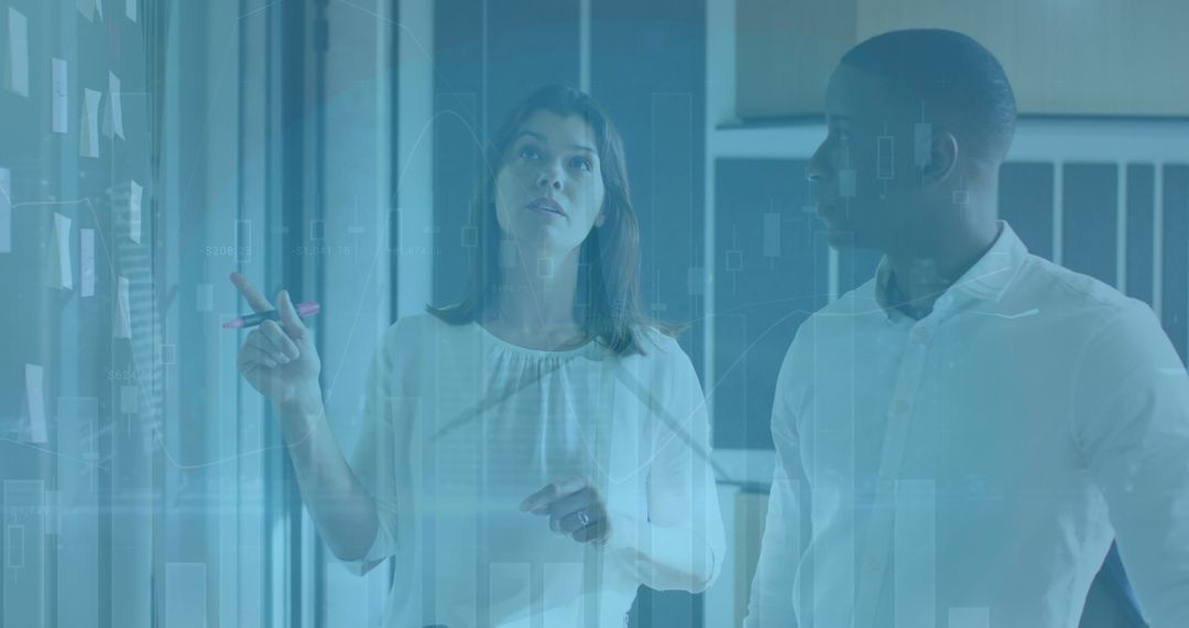 Diverse Professionals Analyzing Financial Data Visualization Overlay