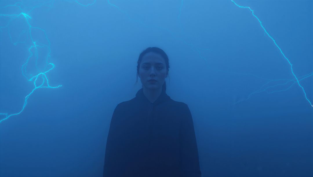 Standing Woman in Deep Blue Fog with Cyan Lightning, Moody Silhouette Portrait, Cinematic