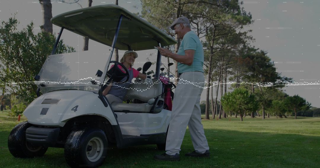 Senior Couple Reviewing Golf Scorecard on Scenic Fairway