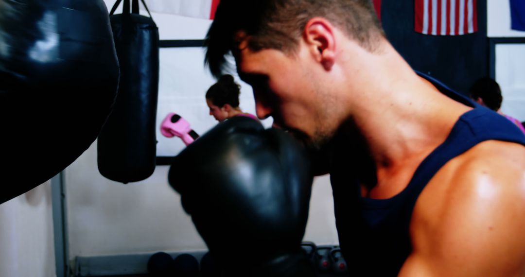 Focused Male Boxer Training in Gym - Free Images, Stock Photos and Pictures on Pikwizard.com