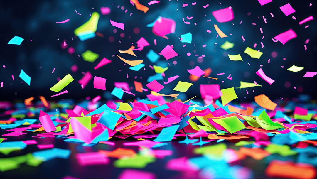 Floating Neon Confetti Pieces on Dark Surface