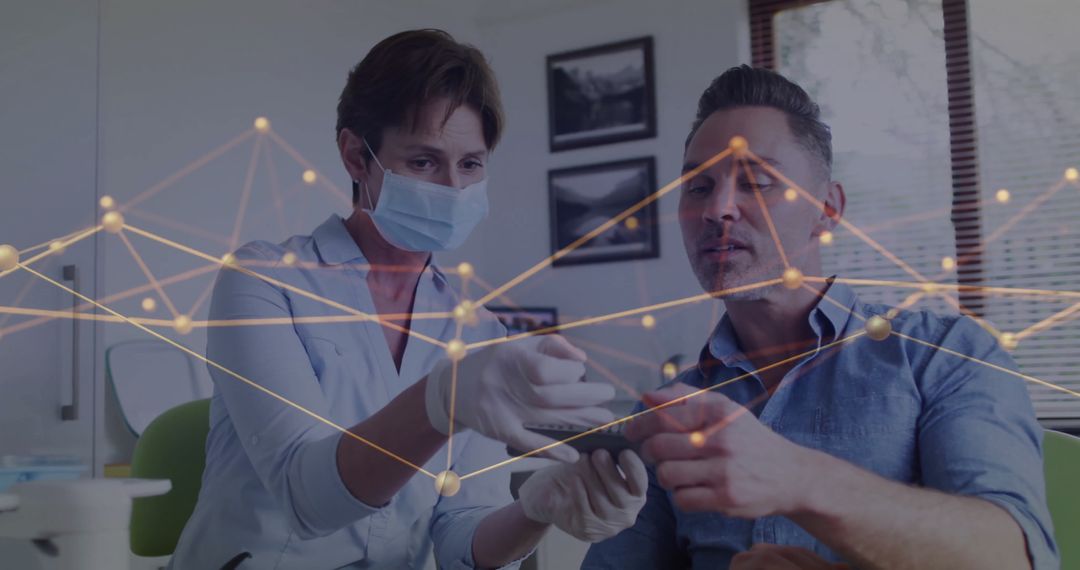 Healthcare Professional Discussing Treatment with Patient Using Digital Tablet