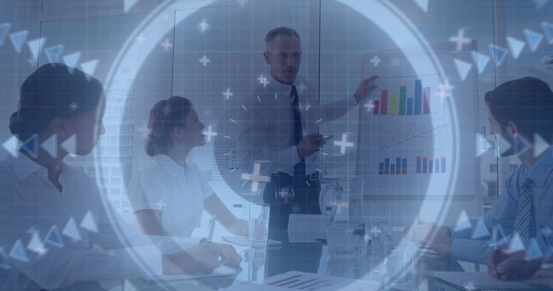 Professional Presenting Charts to Team in Conference Room