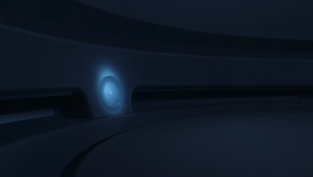 Glowing Blue Mesh Grille Casting Halo on Curved Futuristic Pod Wall with Recessed Vent