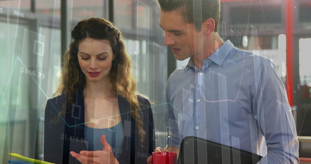 Business Colleagues Discussing Market Graphs in Modern Office