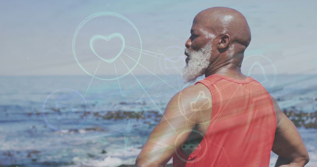 Senior Man Embracing Fitness Technology by the Ocean