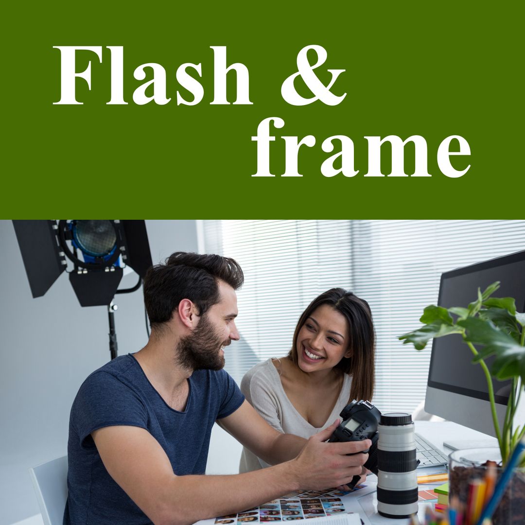 Two Photographers Sharing Creative Moments in Studio Workspace