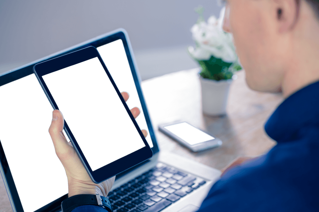 Businessman Utilizing Tablet With Transparent Screen