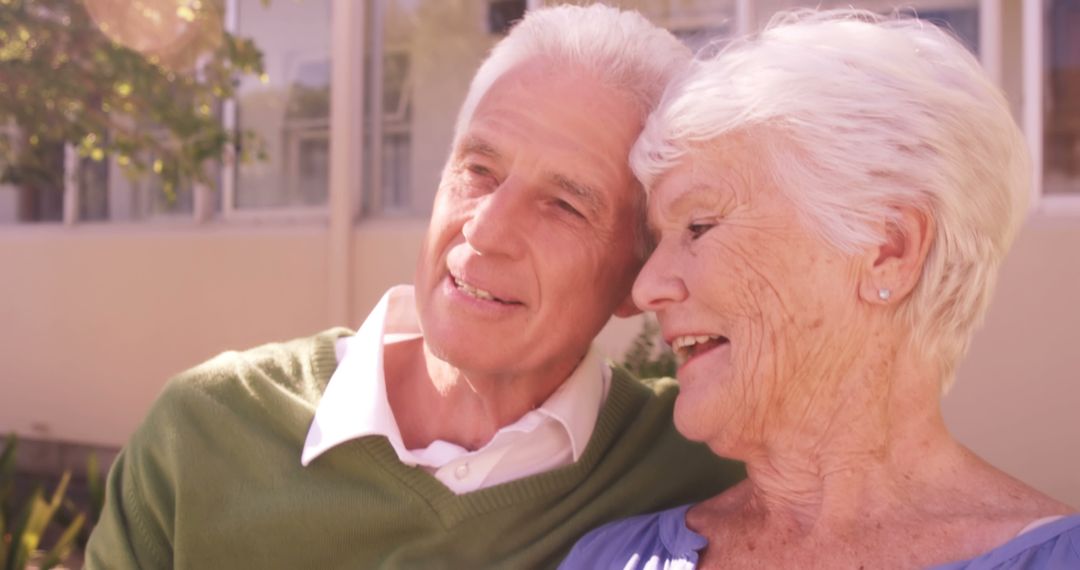 Senior couple sitting together in the garden - Free Images, Stock Photos and Pictures on Pikwizard.com