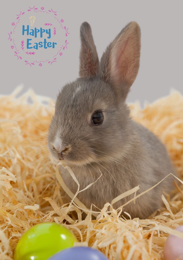 Easter Bunny with Colorful Eggs on Hay Nest