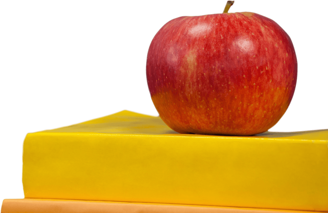 Red Apple Balancing on Yellow Books Transparent Background