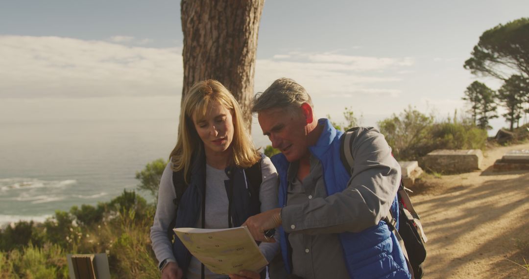 Senior Couple Exploring Countryside Hiking Together
