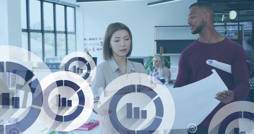 Diverse Architects Collaborating on Modern Blueprint Design in Office